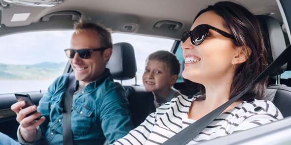 QBANK Car Buying Service - Family in their dream car